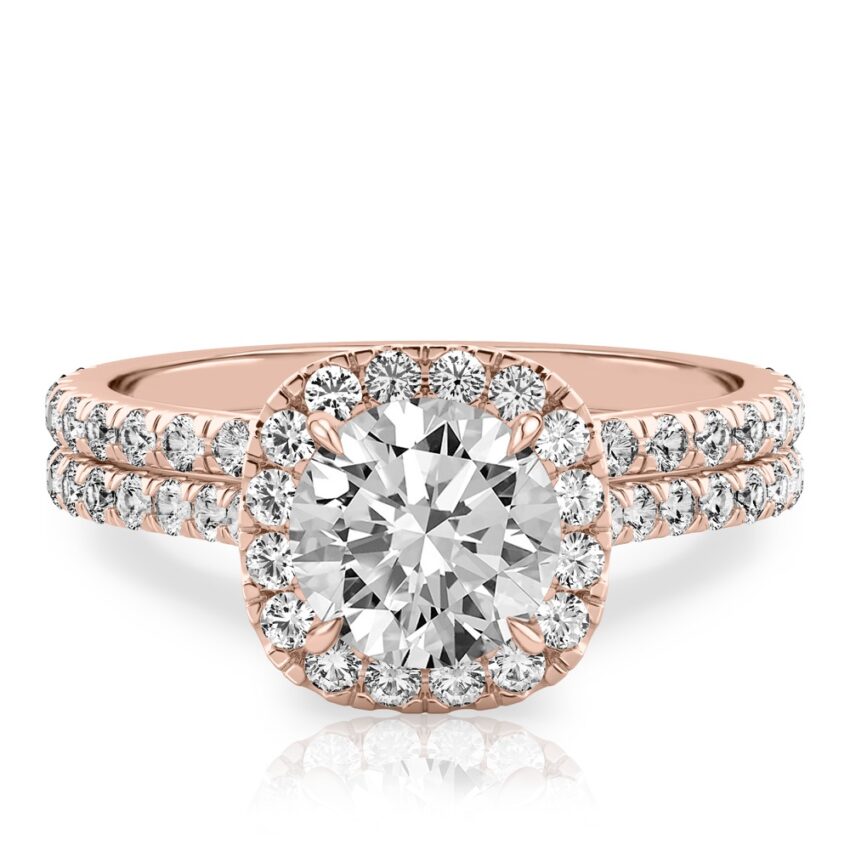 round cut diamond cushion halo engagement ring set in rose gold