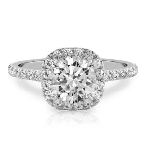 round cut diamond cushion halo engagement ring in white gold