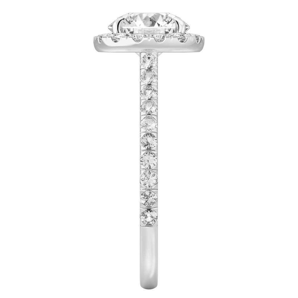 Side view of round cut diamond cushion halo engagement ring white gold