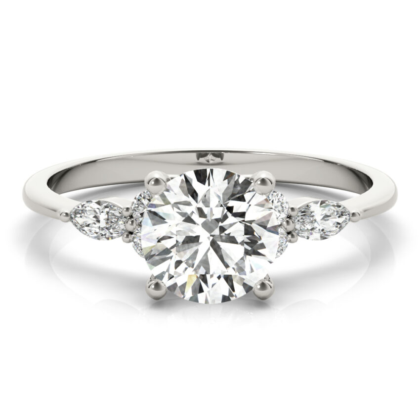 round cut diamond marquise and round cluster engagement ring in white gold