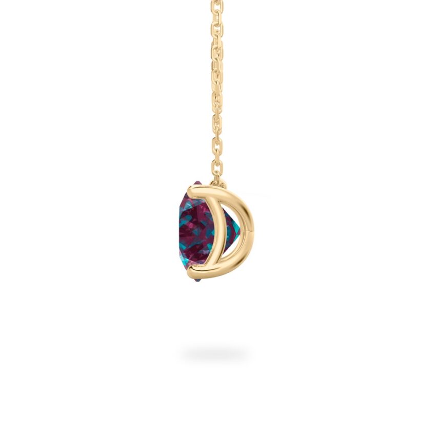 side view of round cut june birthstone necklace in yellow gold
