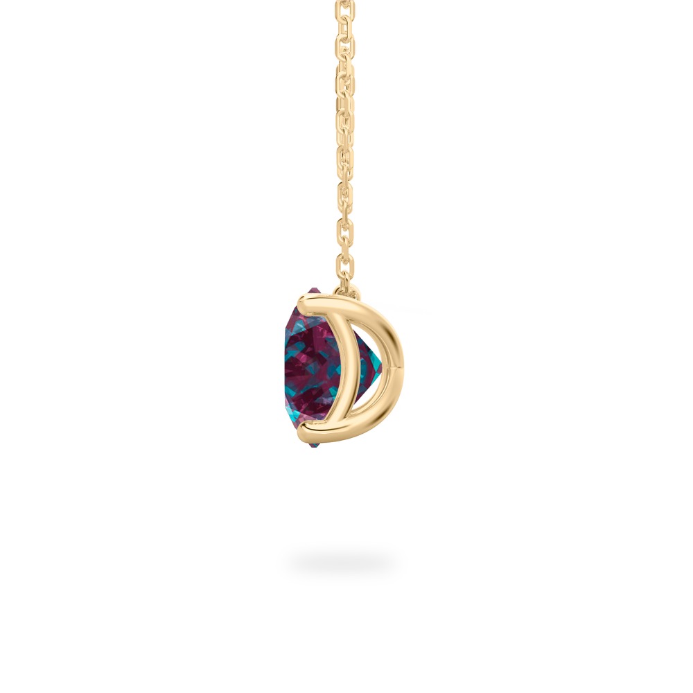 side view of round cut june birthstone necklace in yellow gold
