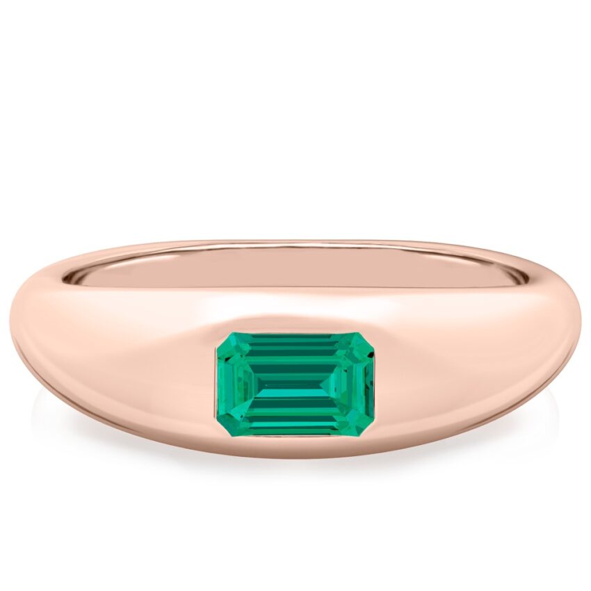 rose gold dome ring with east west set emerald cut emerald gemstone