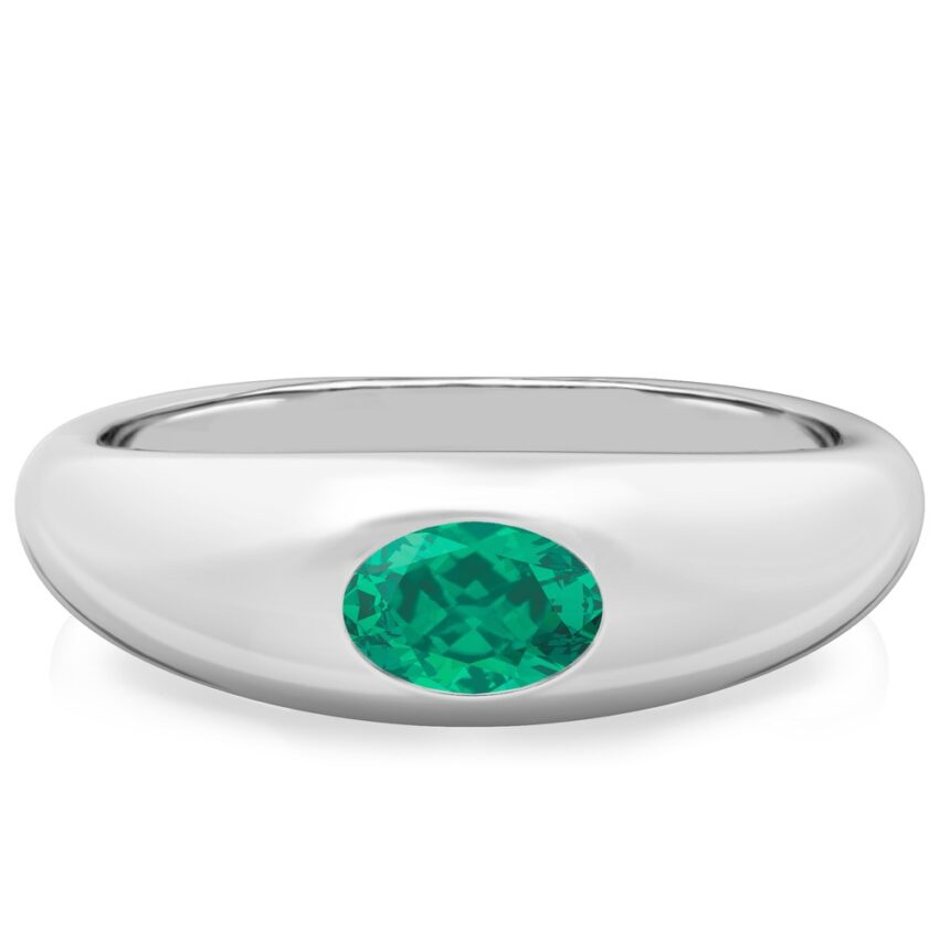 white gold dome ring with east west set oval emerald gemstone