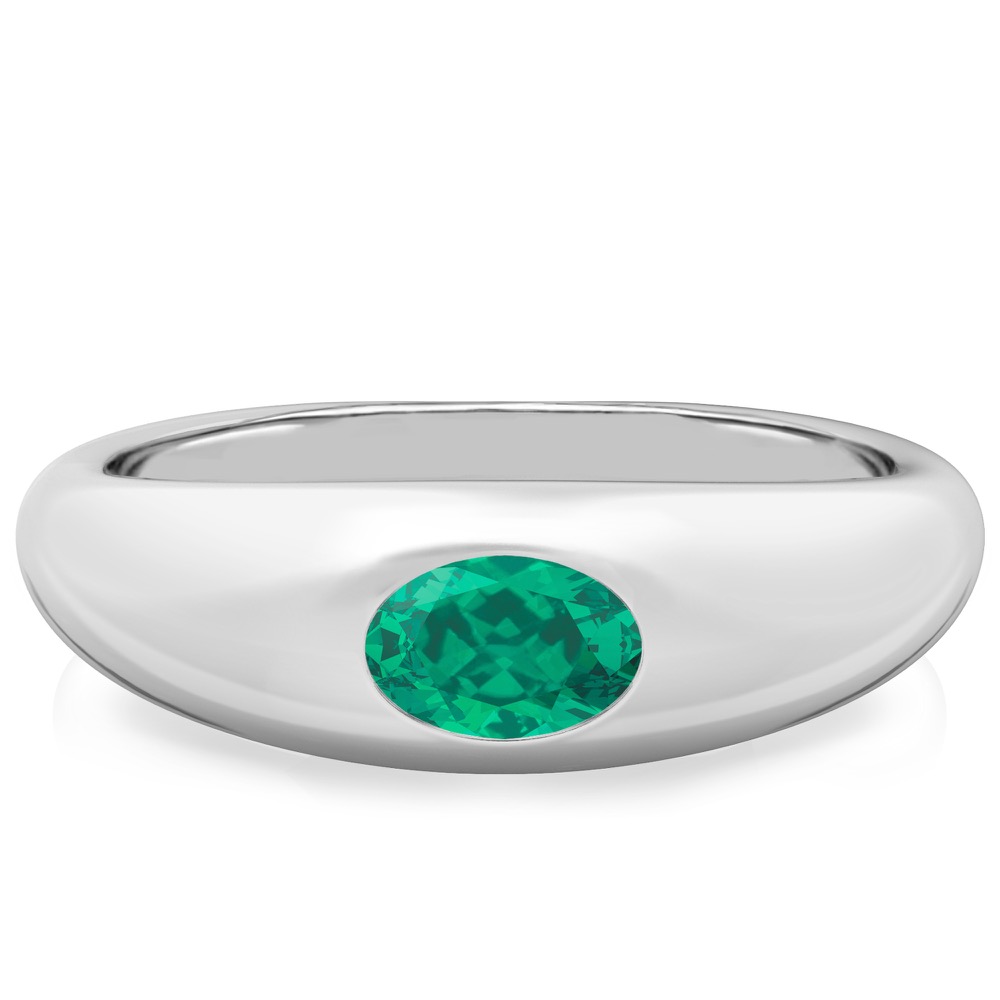 white gold dome ring with east west set oval emerald gemstone