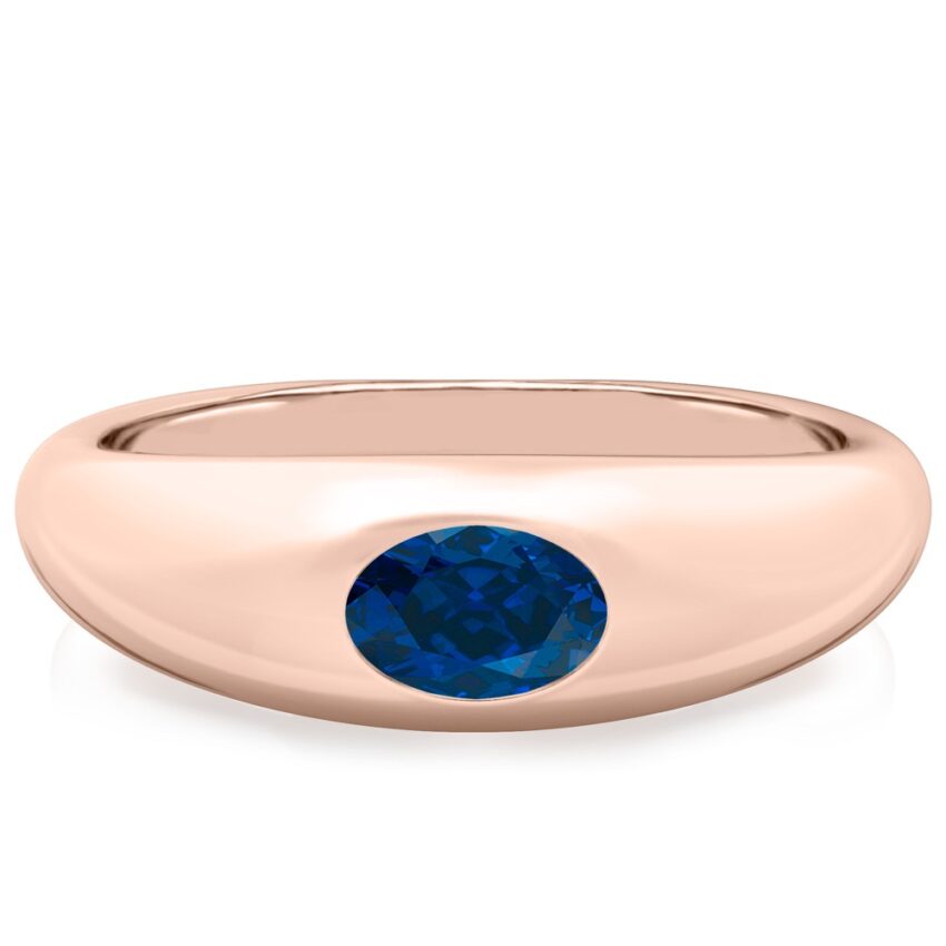 domed ring in rose gold with oval blue sapphire