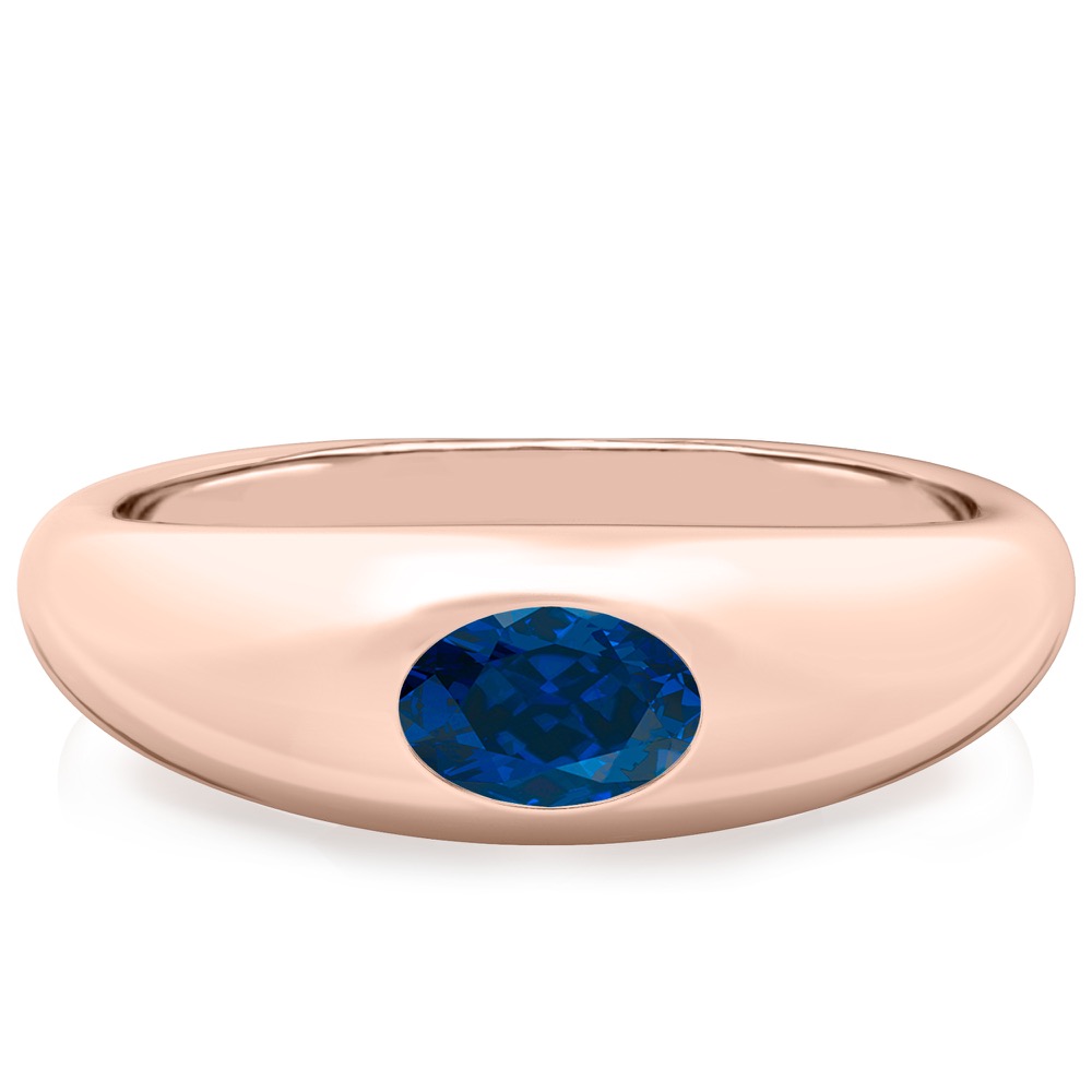 domed ring in rose gold with oval blue sapphire