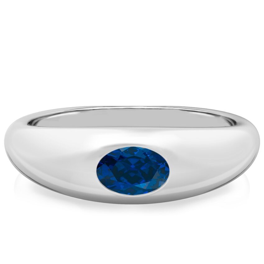 domed ring in white gold with oval blue sapphire