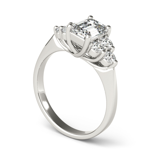 angle view of cluster side stone trellis engagement ring in palladium with emerald cut diamond