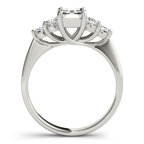 side view of cluster side stone trellis engagement ring in white gold with emerald cut diamond