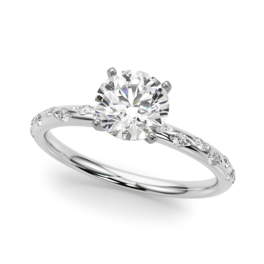 angle view of round cut diamond burnished diamond engagement ring in platinum