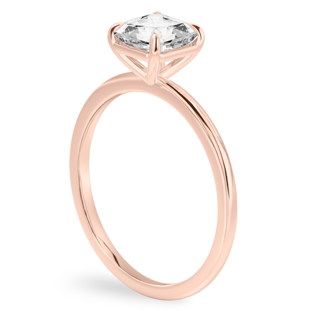 Angle view of asscher cut diamond delicate solitaire engagement ring rose gold