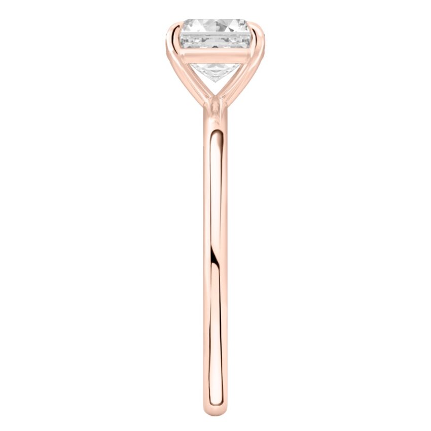 Side view of asscher cut diamond delicate solitaire engagement ring rose gold