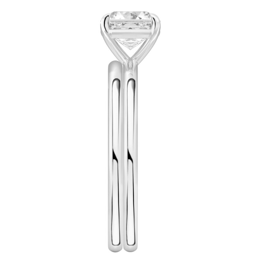 Side view of asscher cut diamond delicate solitaire engagement ring set palladium