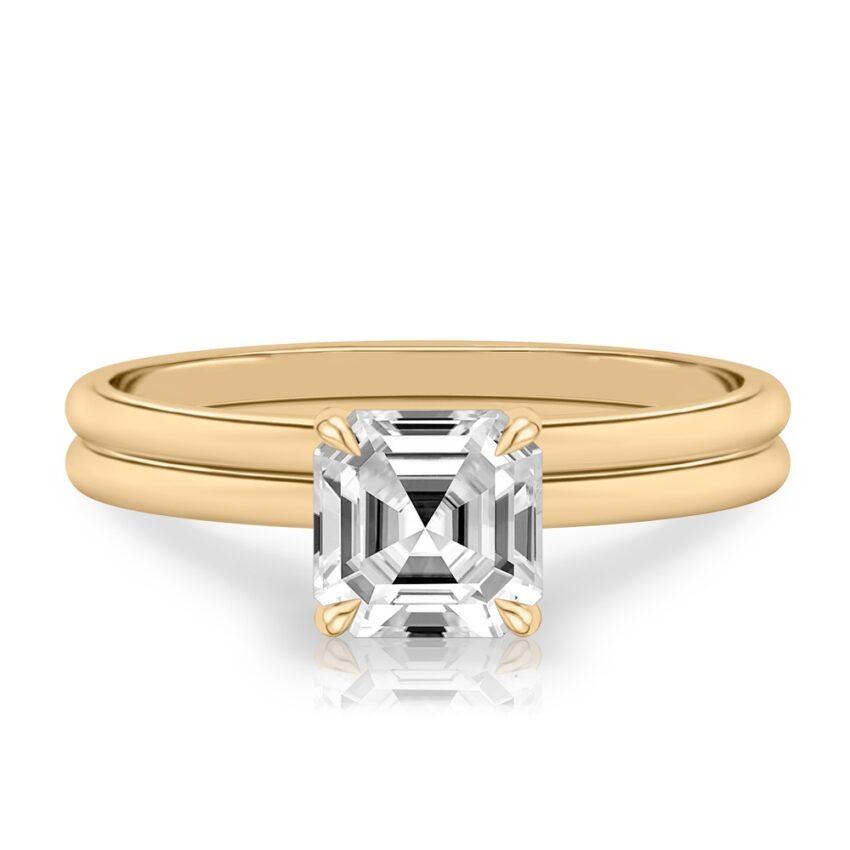 asscher cut diamond delicate solitaire engagement ring in set yellow gold