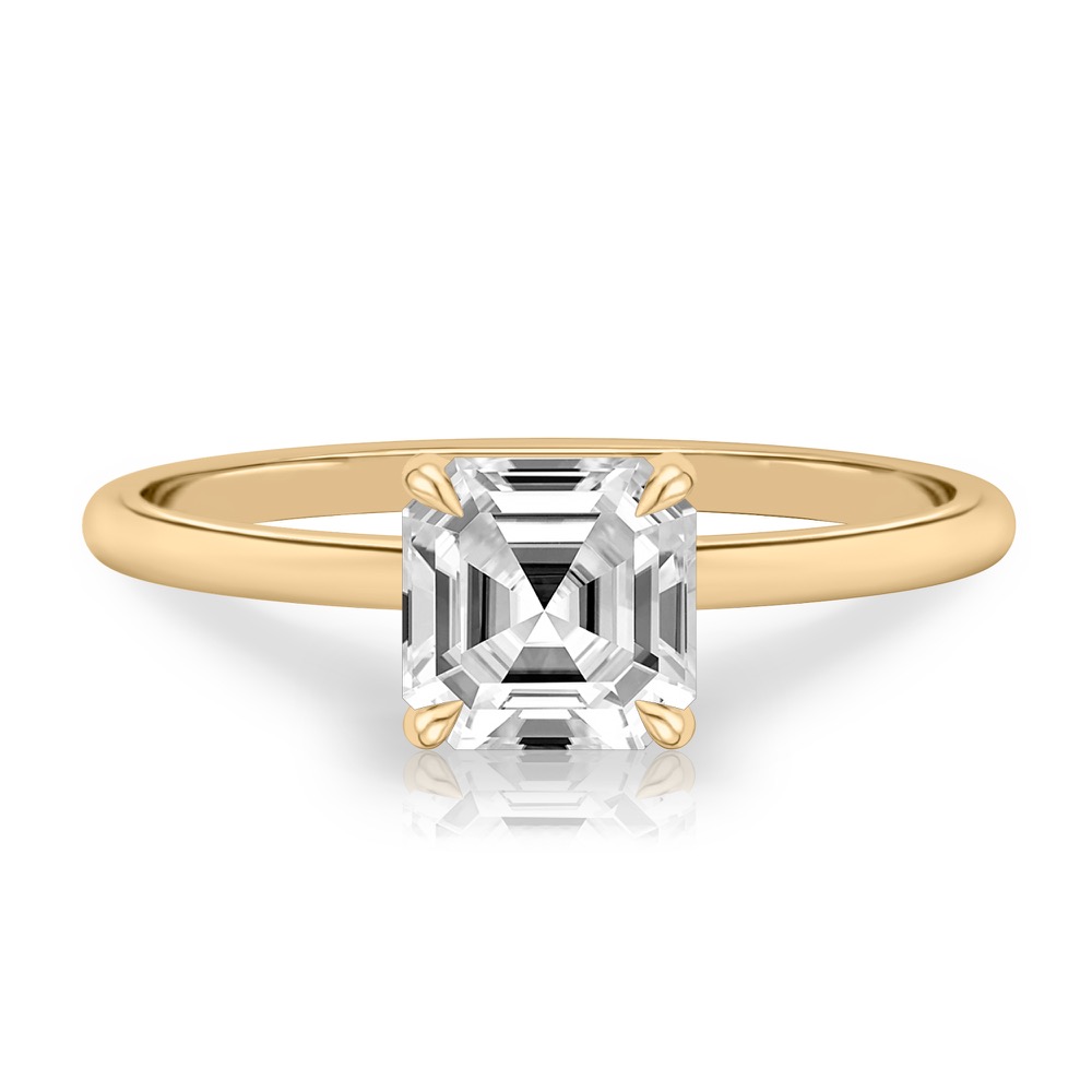 asscher cut diamond delicate solitaire engagement ring in yellow gold