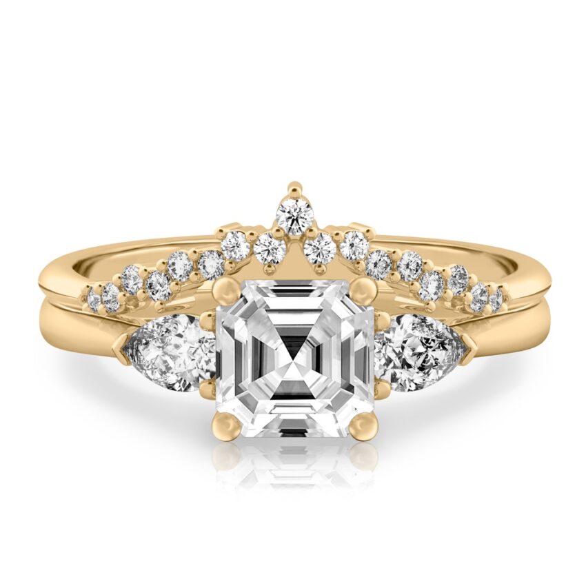 asscher cut diamond pear side stone engagement ring set yellow gold