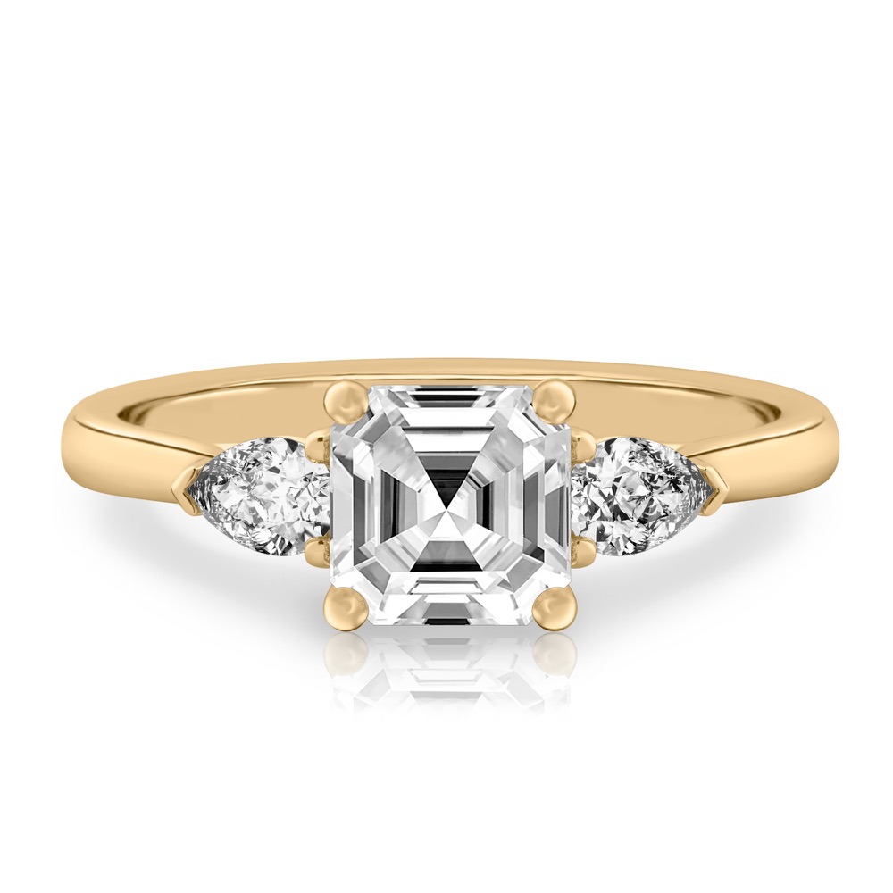 asscher cut diamond pear side stone engagement ring yellow gold