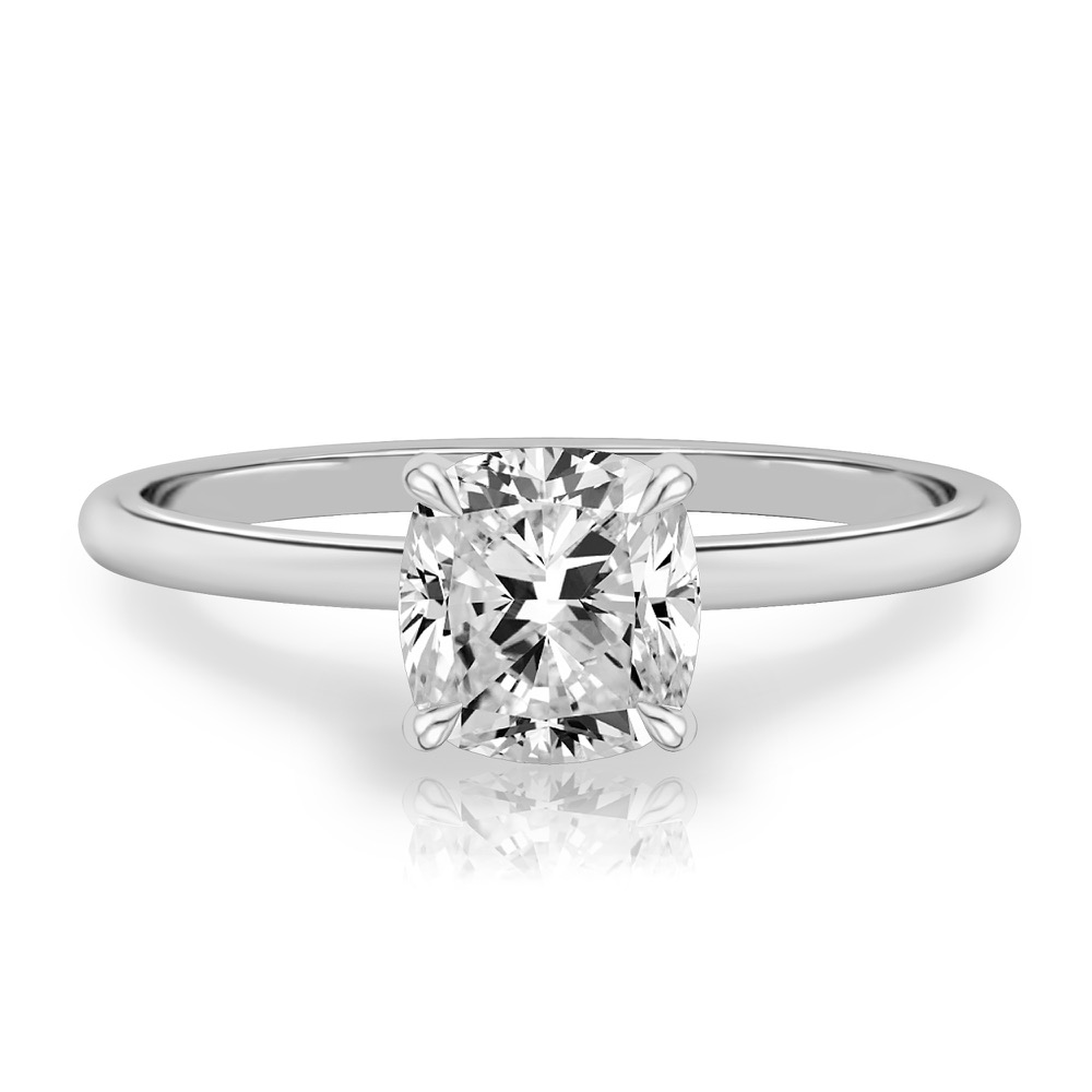 cushion cut diamond delicate solitaire engagement ring in platinum