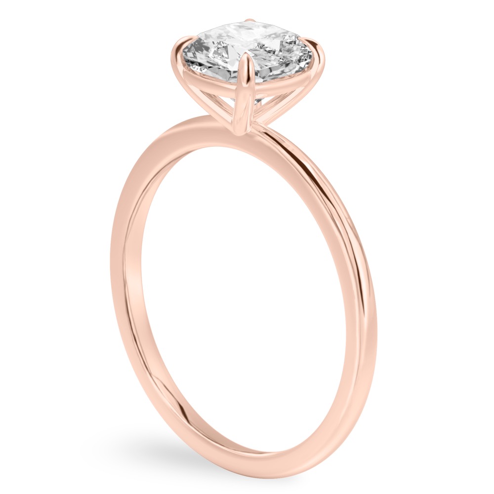 Angle view of cushion cut diamond delicate solitaire engagement ring rose gold