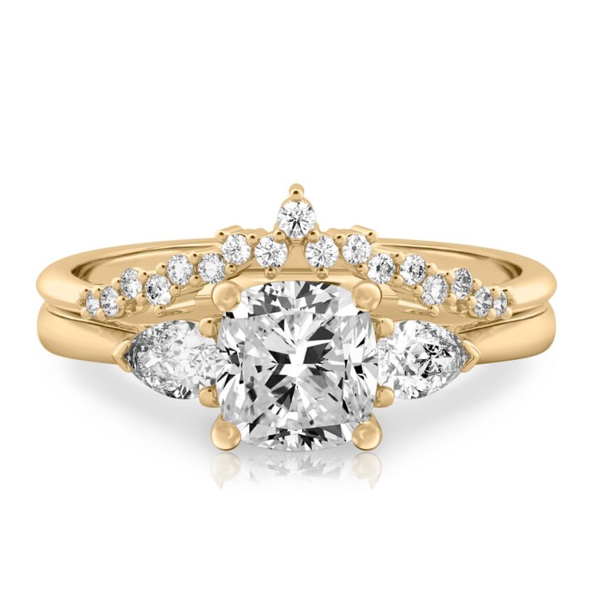 cushion cut diamond pear side stone engagement ring set yellow gold