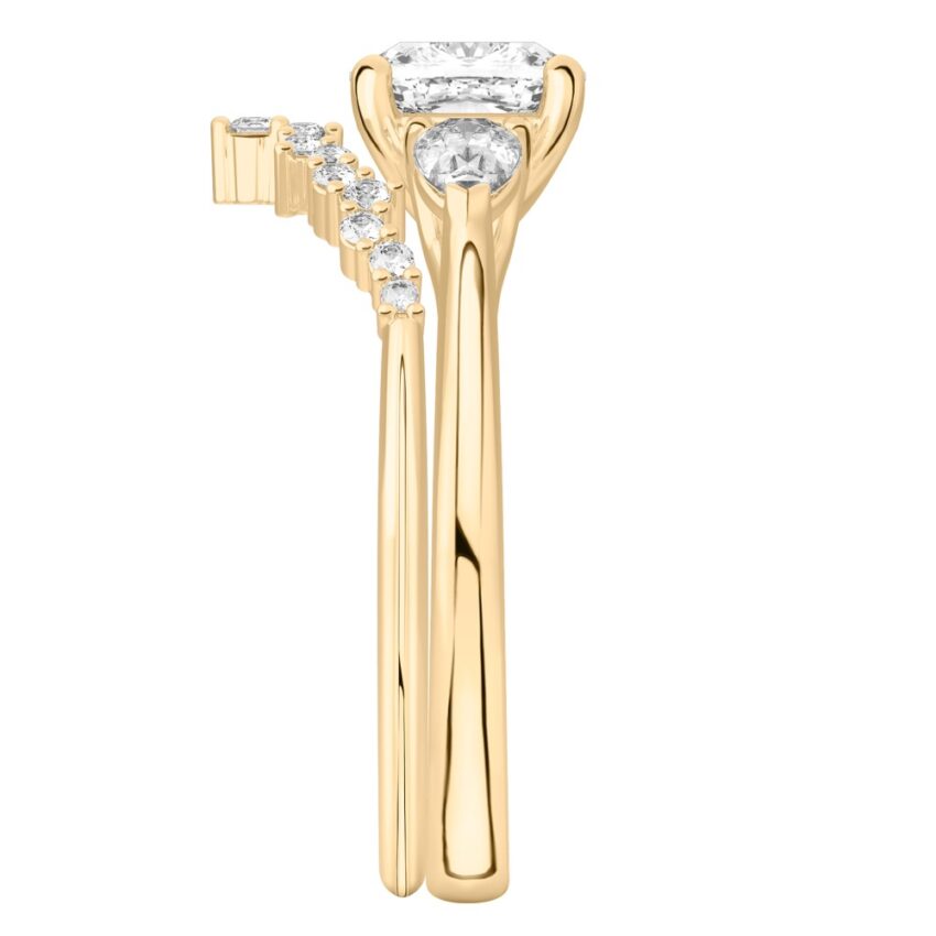 cushion cut diamond pear side stone engagement ring set yellow gold side