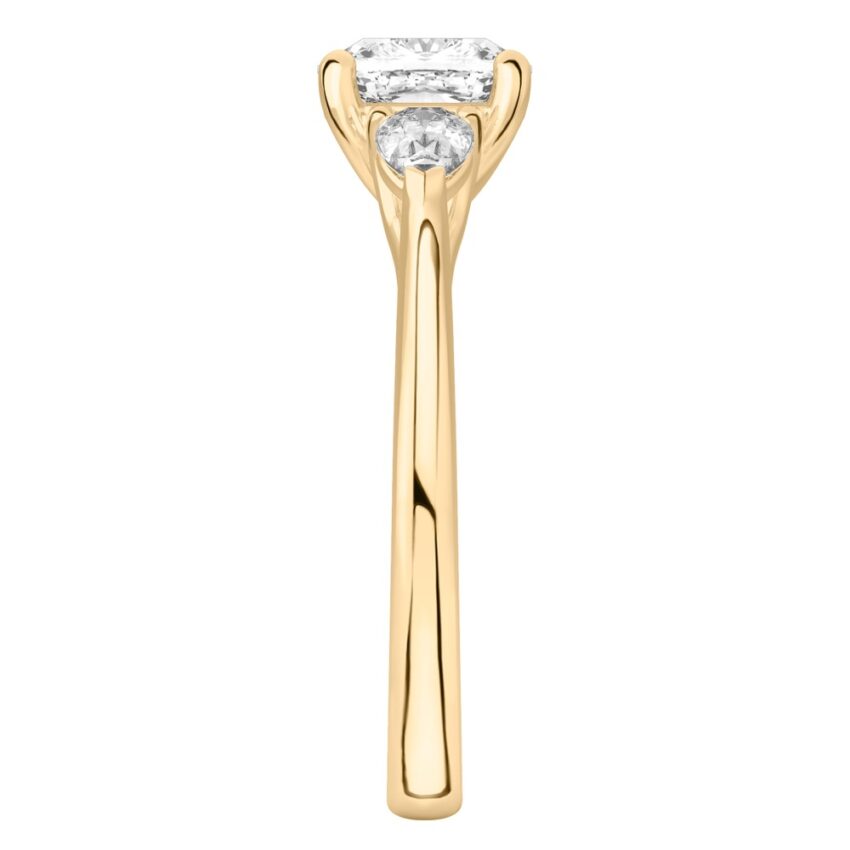 cushion cut diamond pear side stone engagement ring yellow gold side