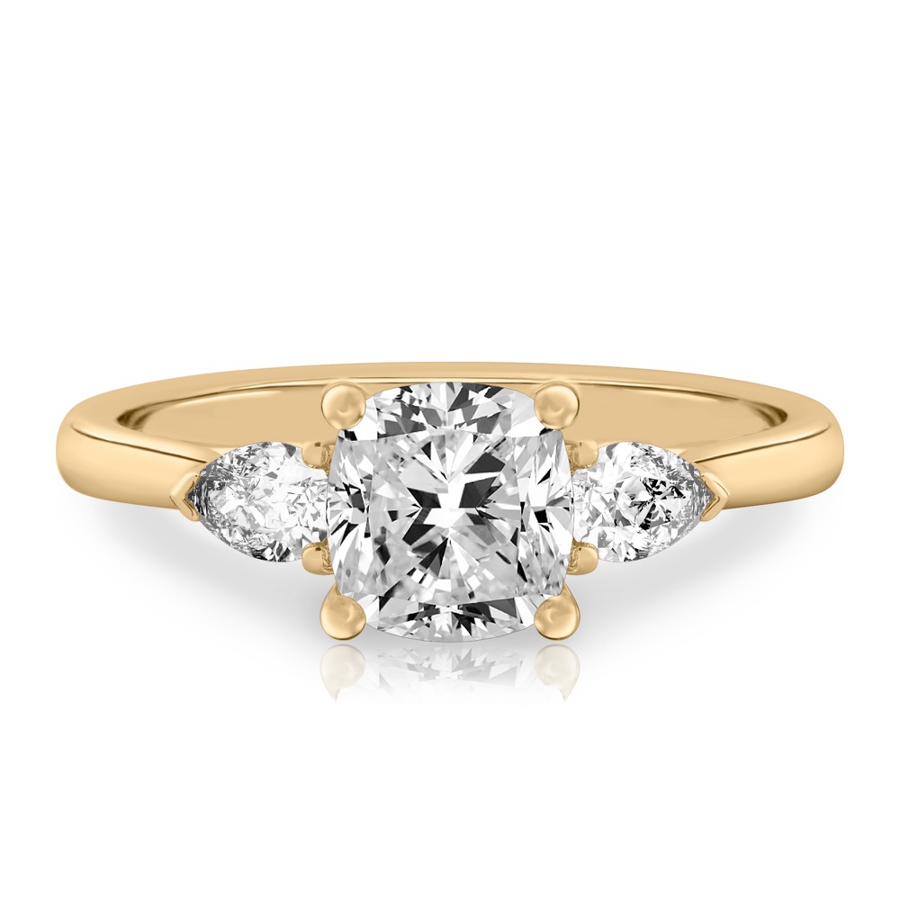 cushion cut diamond pear side stone engagement ring yellow gold