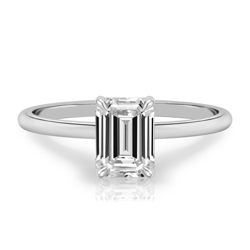 emerald cut diamond delicate solitaire engagement ring in platinum