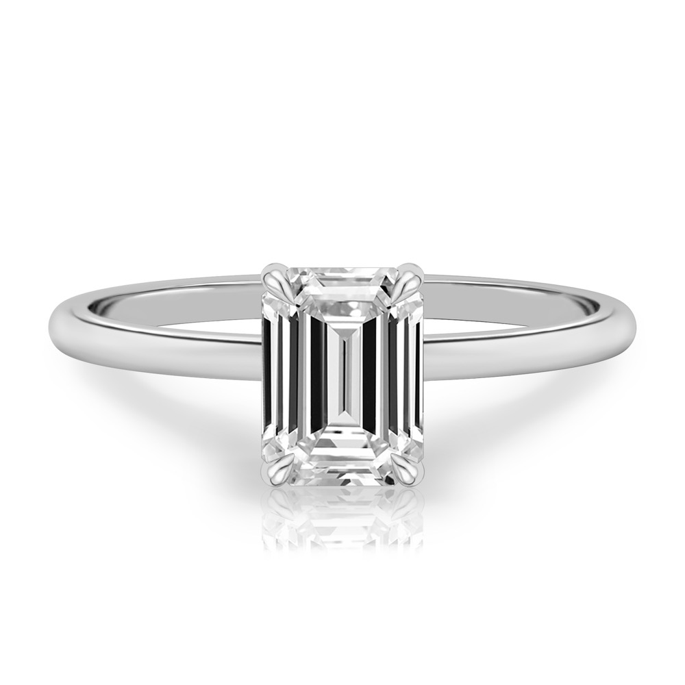 emerald cut diamond delicate solitaire engagement ring in platinum