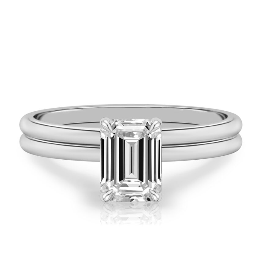 emerald cut diamond delicate solitaire engagement ring in set white gold