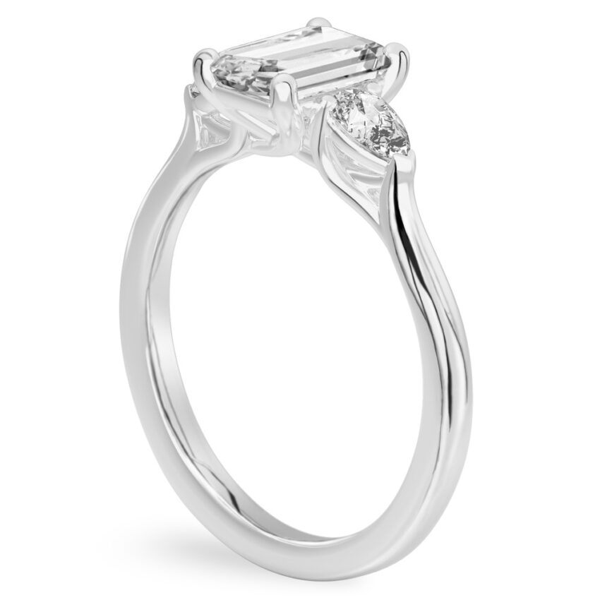 emerald cut diamond pear side stone engagement ring platinum angle