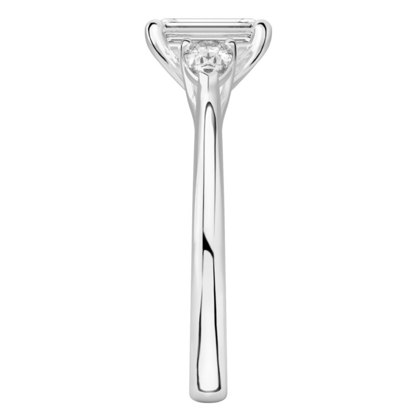 emerald cut diamond pear side stone engagement ring white gold side