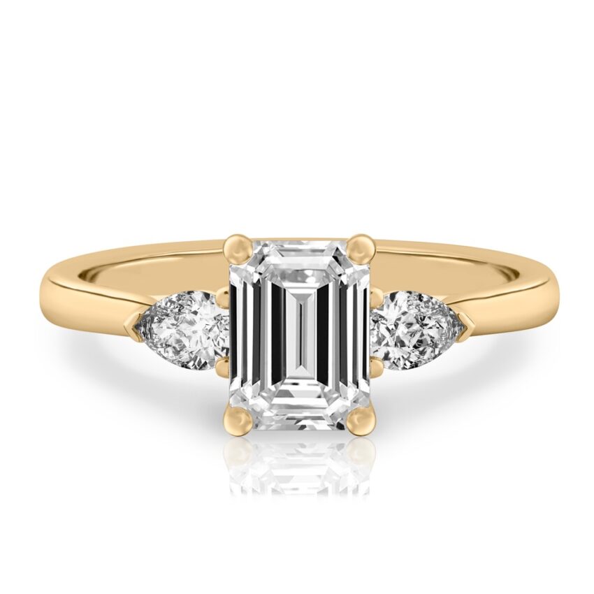emerald cut diamond pear side stone engagement ring yellow gold