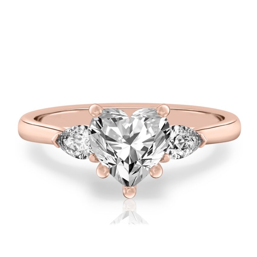 heart shape diamond pear side stone engagement ring rose gold