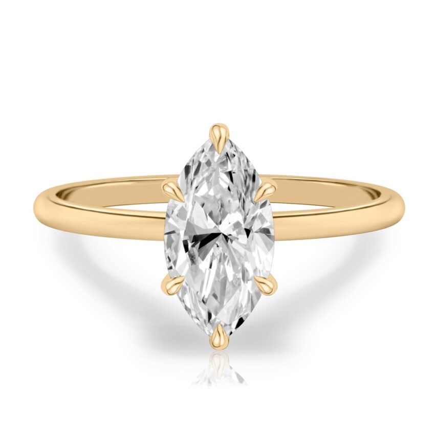 marquise cut diamond delicate solitaire engagement ring in yellow gold