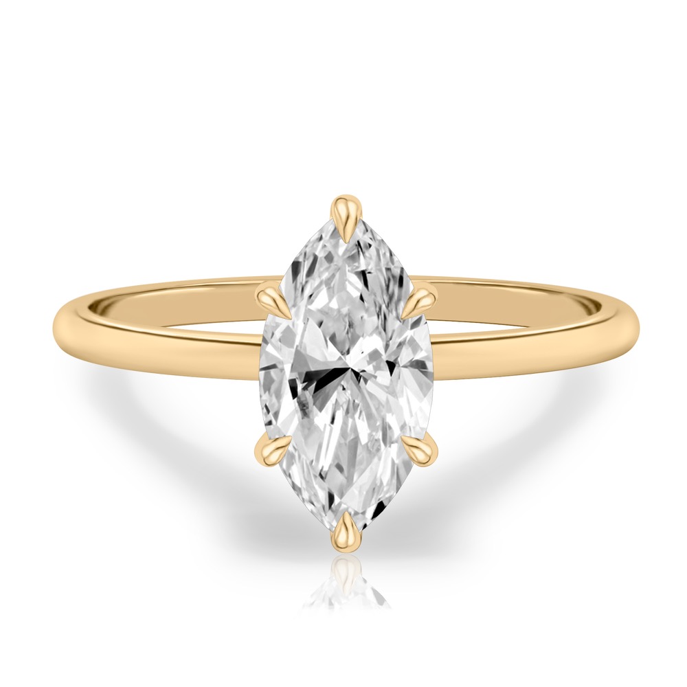 marquise cut diamond delicate solitaire engagement ring in yellow gold