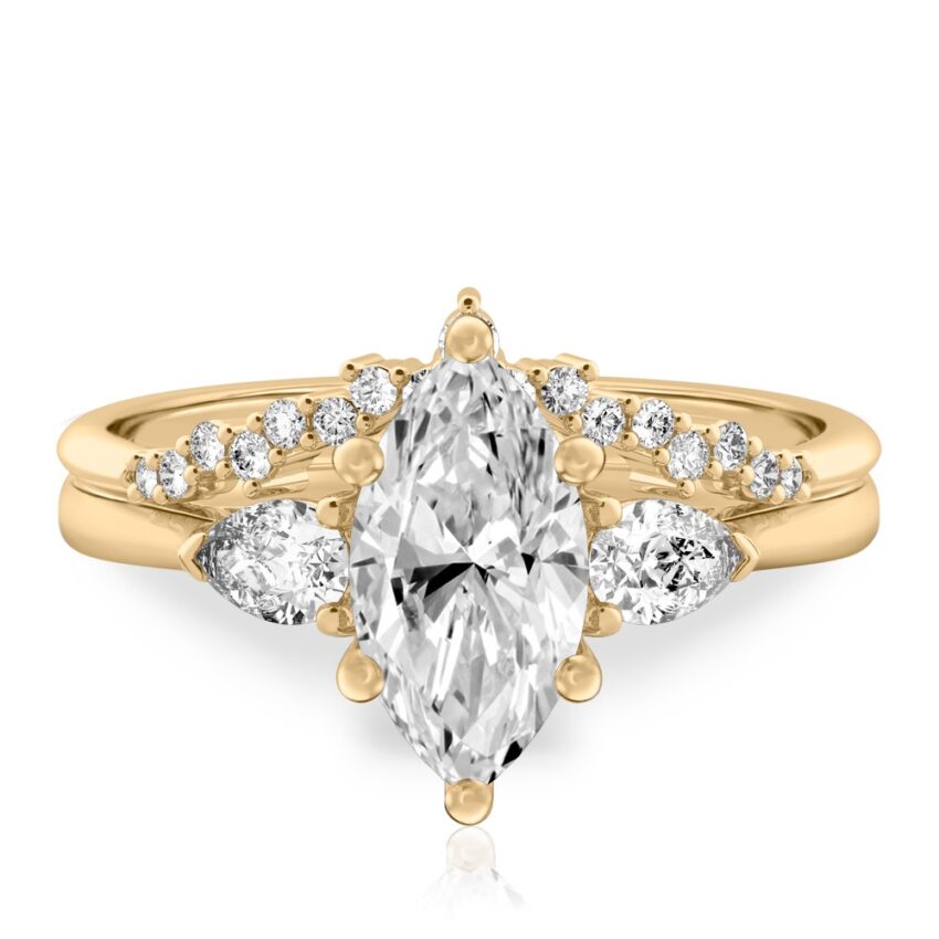 marquise cut diamond pear side stone engagement ring set yellow gold