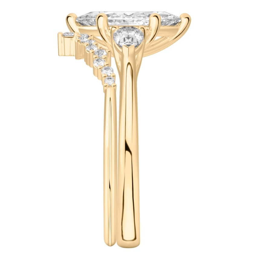 marquise cut diamond pear side stone engagement ring set yellow gold side
