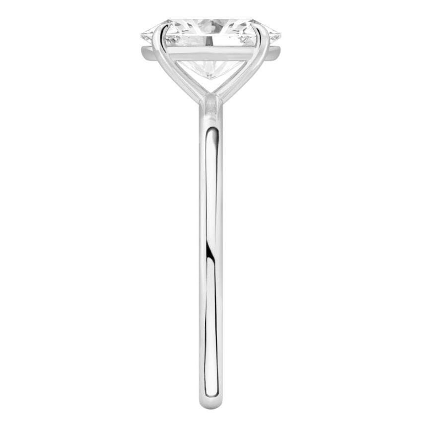 Side view of oval shape diamond delicate solitaire engagement ring palladium