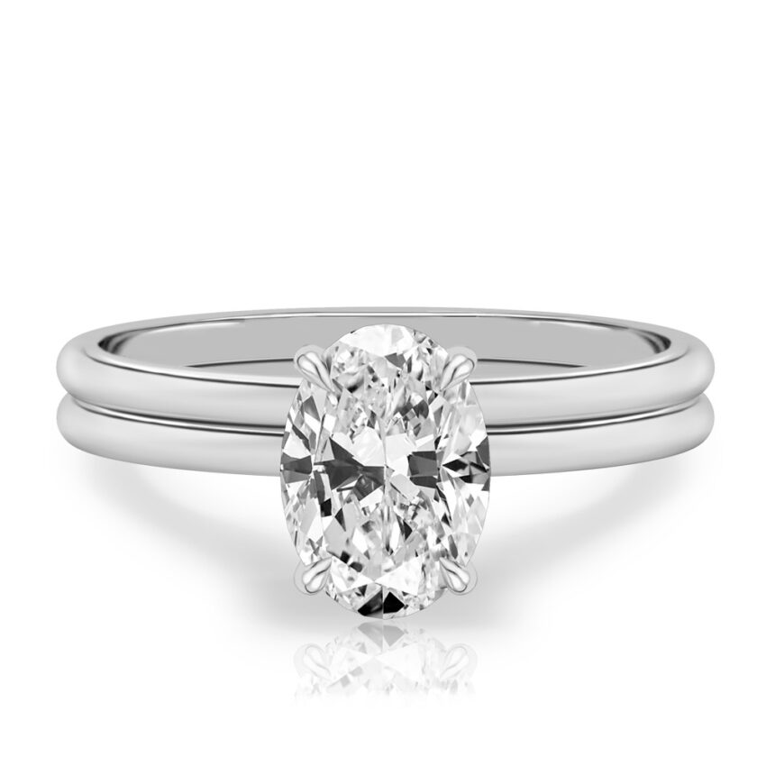 oval shape diamond delicate solitaire engagement ring in set white gold