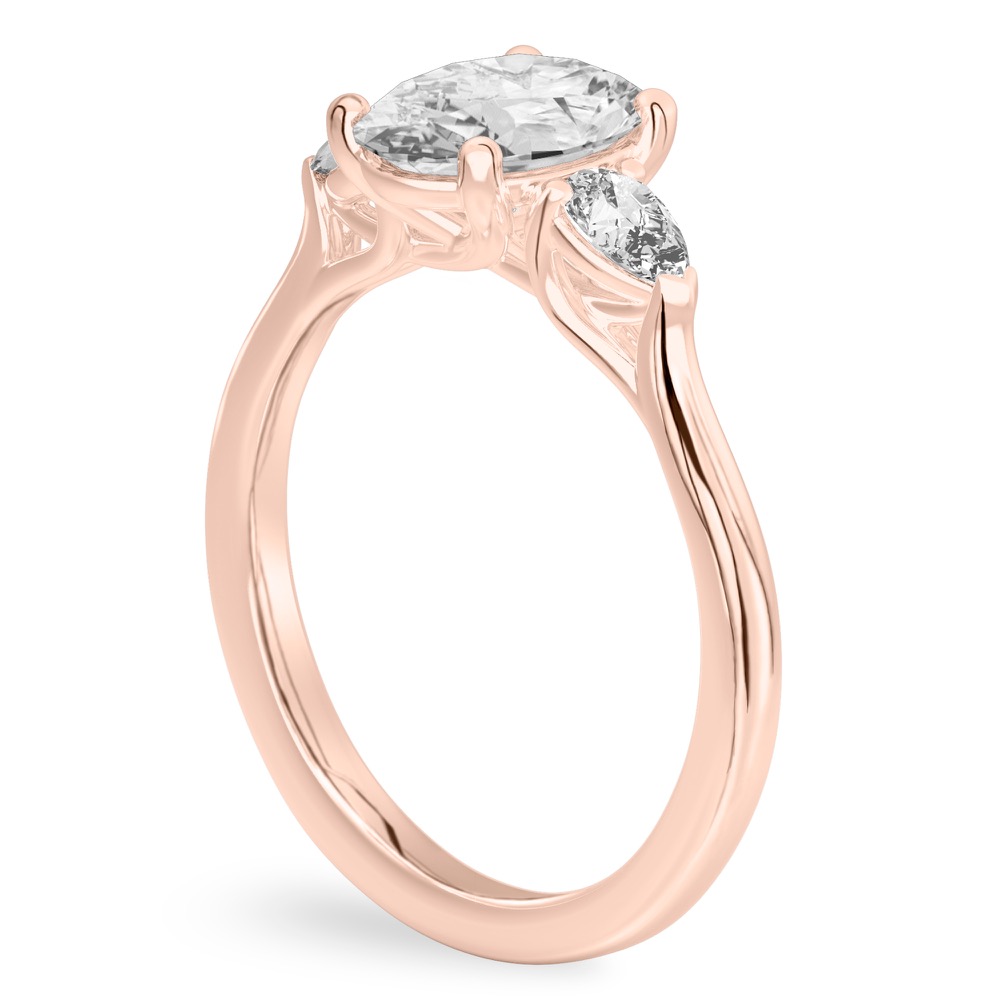 oval shape diamond pear side stone engagement ring rose gold angle