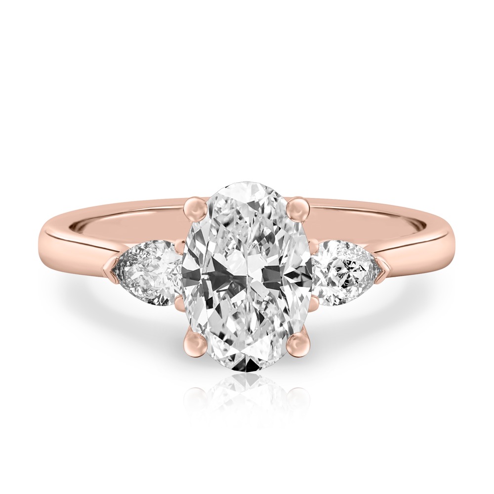 oval shape diamond pear side stone engagement ring rose gold