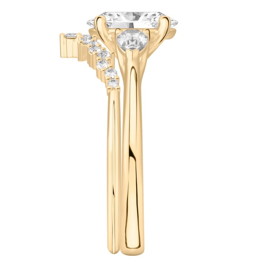oval shape diamond pear side stone engagement ring set yellow gold side