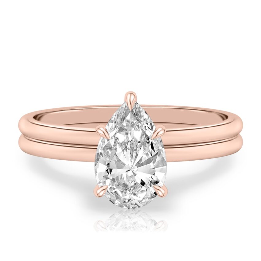 pear shape diamond delicate solitaire engagement ring in set rose gold
