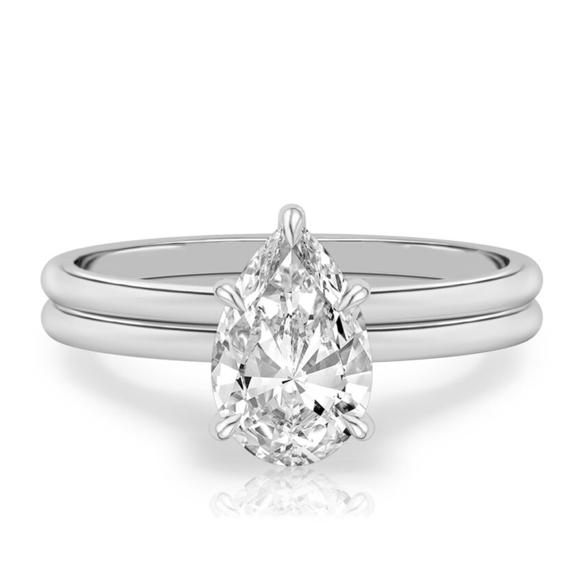 pear shape diamond delicate solitaire engagement ring in set white gold