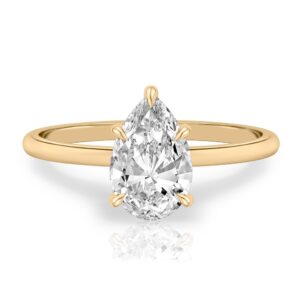 pear shape diamond delicate solitaire engagement ring in yellow gold