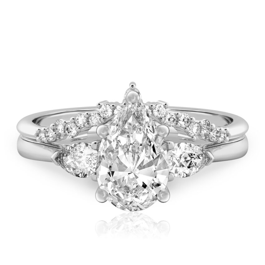 pear shape diamond pear side stone engagement ring set platinum