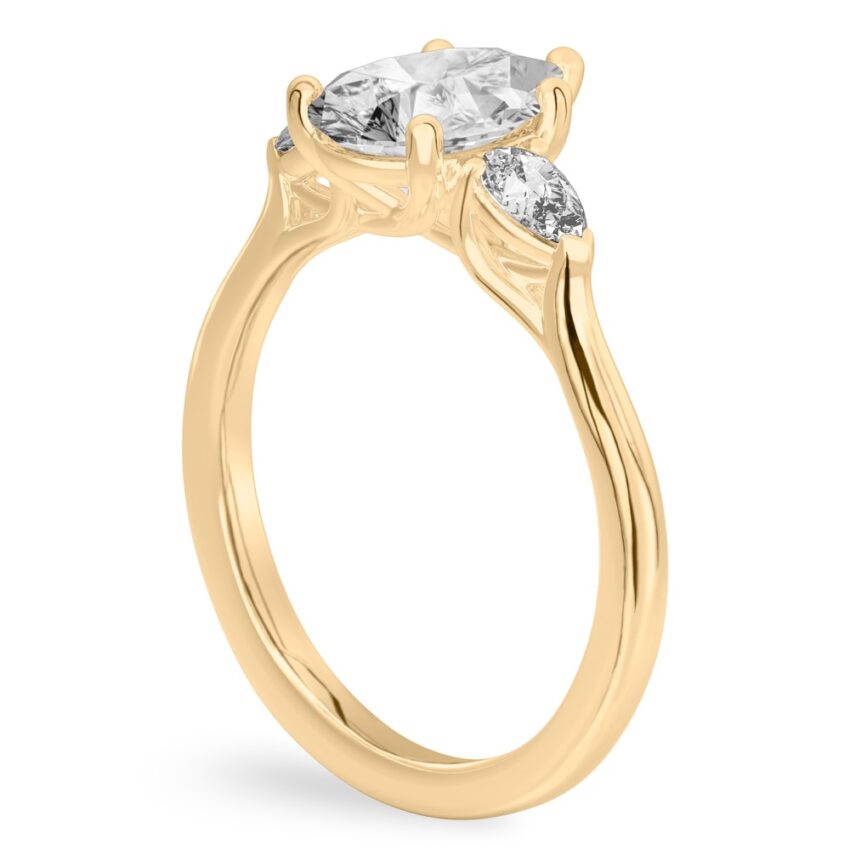 pear shape diamond pear side stone engagement ring yellow gold angle
