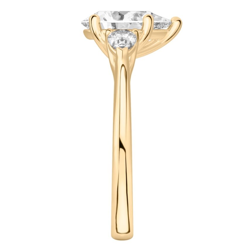 pear shape diamond pear side stone engagement ring yellow gold side